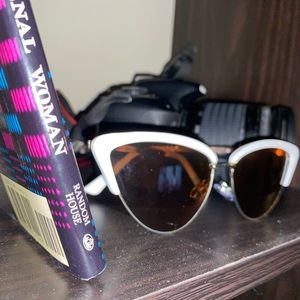 White Rimmed Cat Eye Sunglasses.